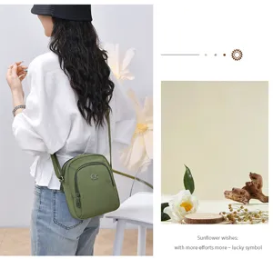 Stylish multi-layer nylon crossbody bag for women, versatile green single shoulder bag.
