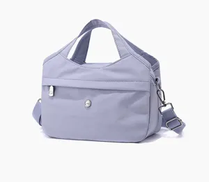 Women multi-compartment nylon crossbody bag top handles shoulder strap light purple chic