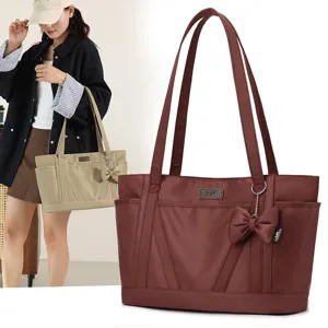Large capacity canvas tote bag for women, stylish commuting handbag with bow and shoulder straps.
