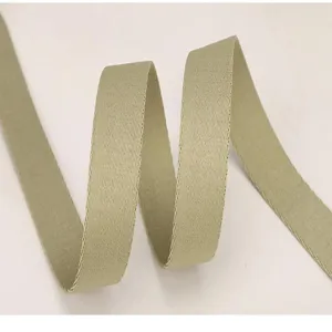 Close-up detail of durable khaki fabric webbing strap, tightly woven texture for DIY bags.