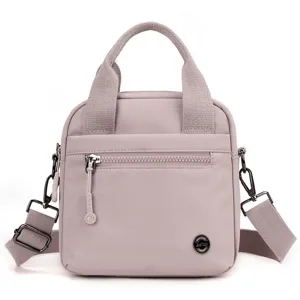 Lightweight canvas crossbody bag for women, casual single shoulder handbag with top handle.
