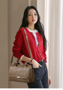 Vintage brown leather handbag for women, elegant top handle shoulder bag with adjustable strap.