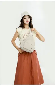 Trendy casual multi-purpose small backpack and chest bag in versatile beige color.