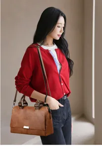 Stylish large capacity leather handbag for women, casual commuter shoulder bag with metal lock.