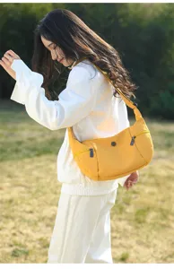 Casual canvas crossbody bag for women, large capacity minimalist shoulder bag in yellow.