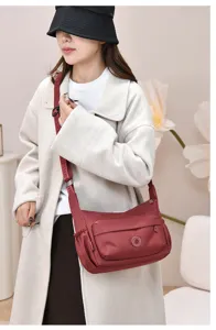 Stylish women nylon crossbody shoulder bag, versatile casual daily handbag with multi pockets.
