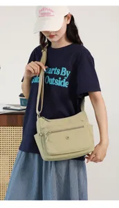 Casual canvas crossbody bag for women, lightweight minimalist shoulder bag for daily commute.