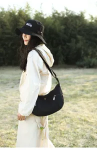 Casual black canvas crossbody bag for women, simple lightweight hobo shoulder bag daily.