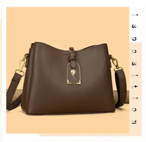 Brown leather shoulder bag stylish daily crossbody handbag with metal rose decor large capacity.