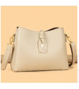 Beige leather shoulder crossbody bag for women, large capacity casual commuter handbag, chic.