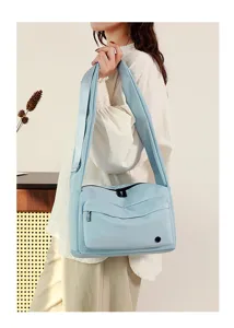 Casual nylon crossbody bag for women, versatile commuting messenger bag with large capacity.