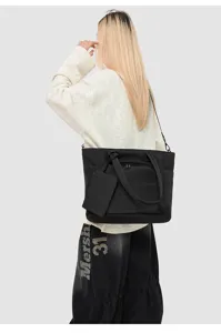 Detail view of the black work tote bag showing multiple compartments and sturdy dual handles.