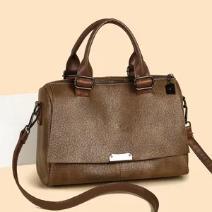 Stylish brown PU leather women handbag, large capacity top handle shoulder commuter bag.