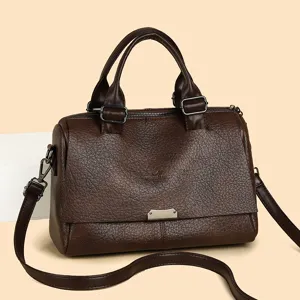 Classic dark brown leather handbag for women, large capacity tote bag with shoulder strap.