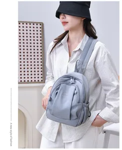 Zaino casual grigio impermeabile borsa scolastica leggera e pratica da viaggio per donna