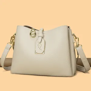 Classic elegant beige shoulder crossbody bag for women, large capacity daily commuter handbag.