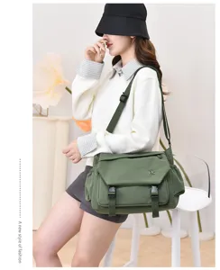Green canvas messenger bag, large capacity, waterproof, Japanese style for students. Stylish.