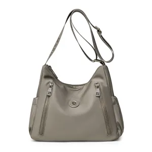 Waterproof nylon shoulder bag for women, casual commuter crossbody bag with multiple zip pockets.