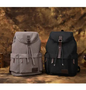 Zaino per laptop in tela resistente da uomo, borsa scolastica per affari di grande capacità.