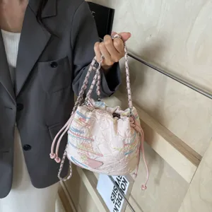 Fashion bucket bag for women 2025 new trendy casual shoulder bag with chain strap and embroidery.