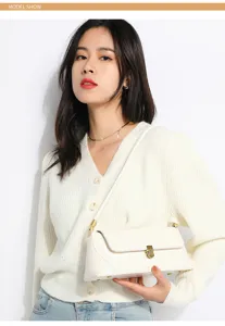 Chic white leather shoulder bag for women, stylish crossbody handbag with gold lock.