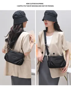 Detailed view of the lightweight casual nylon crossbody shoulder bag with durable fabric.