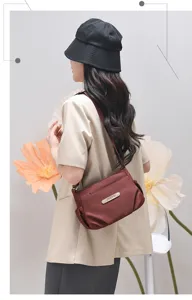 Casual nylon crossbody shoulder bag for women, lightweight large capacity daily purse.