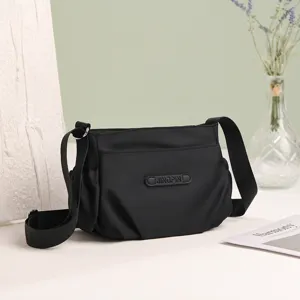 2026 New casual black nylon crossbody bag, large capacity, lightweight and simple style for women.