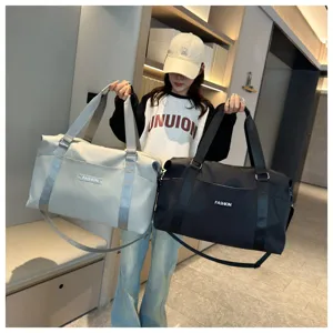 Large capacity multi-functional travel duffel bag with shoulder strap, grey and black.