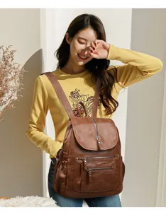 Vintage brown leather backpack for women, large capacity casual travel daypack daily commute.