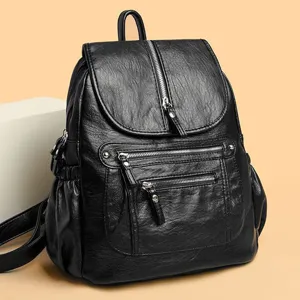 Classic black leather backpack for women, large capacity stylish casual daypack for commute.