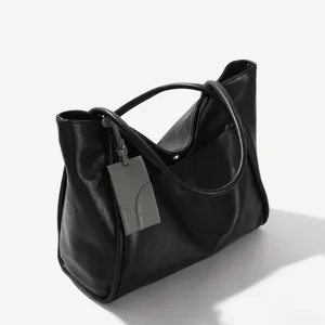 Korean style black large capacity tote bag, stylish versatile single shoulder handbag for women.