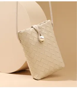 Mini woven leather crossbody phone bag with stylish pearl closure, casual and versatile design.