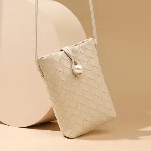 Beige woven leather mini crossbody phone bag for women, stylish casual shoulder bag with pearl.