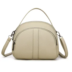 Stylish women crossbody shoulder bag, versatile dome apple bag with top handle for daily use.