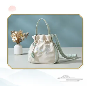 New Chinese style embroidered bucket bag, chic tote and shoulder bag for women daily commute.