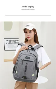 Grauer Freizeitrucksack für Studenten, geräumiger Reiserucksack mit vielen Fächern.