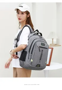 Lässiger grauer Rucksack mit vielen Fächern für Schule, Reisen und Laptop-Nutzung.