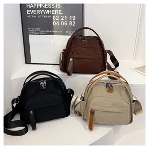 Casual nylon shoulder bag with multiple pockets, stylish daily commuter handbag for women.
