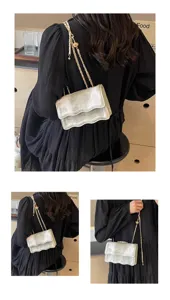 Detail view of the stylish wavy flap chain shoulder bag showcasing exquisite design and chain.