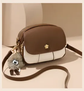 Women contrast color crossbody bag stylish soft leather mini shoulder bag with cute fluffy charm