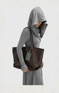Large capacity soft leather tote bag for women, stylish minimalist commuter shoulder bag.