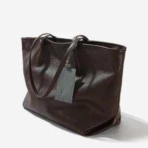 Large capacity soft leather tote bag for women, stylish commuting shoulder and crossbody bag.