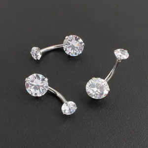Surgical steel curved barbell belly ring with sparkling round cubic zirconia body piercing jewelry.