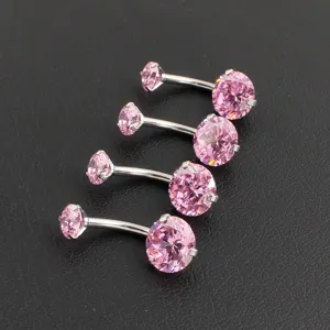 Stainless steel curved barbell belly button ring set with pink cubic zirconia body piercing.