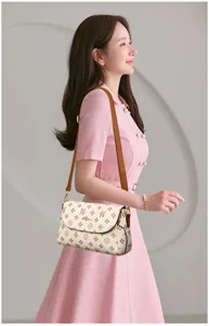Elegant women shoulder bag with classic monogram pattern, stylish crossbody bag for daily use.