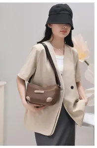 Solid color nylon crossbody shoulder bag casual fashion womens daily handbag and purse.