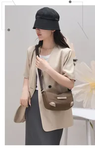 Stylish minimalist nylon crossbody bag for women, perfect for daily casual wear and travel use.