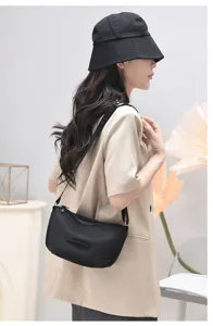 Stylish black nylon crossbody bag for women casual shoulder handbag daily commuting trendy.