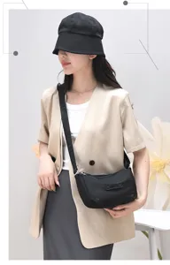 Stylish black nylon crossbody shoulder bag for women, perfect for casual daily wear and travel.